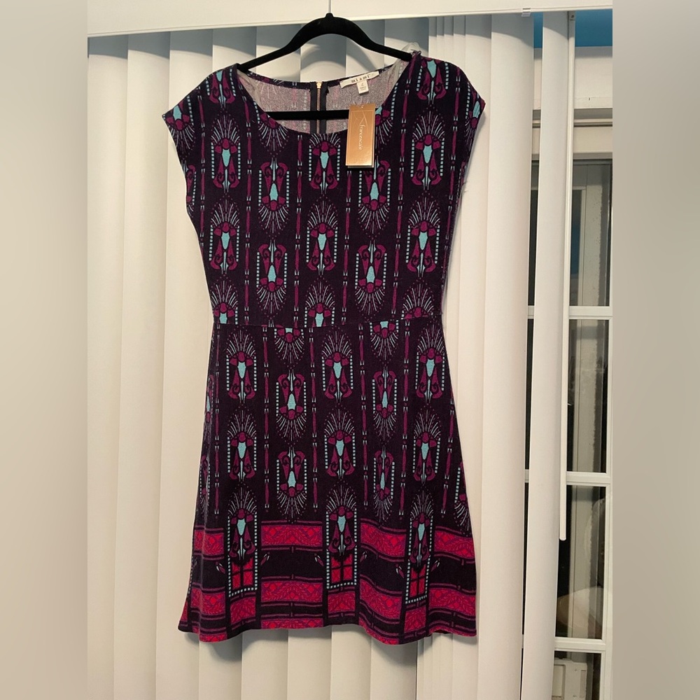 NWT Francesca’s fit and flare dress, size large, light sweater material.